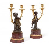 A PAIR OF LOUIS XVI STYLE FIGU