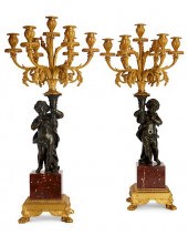 A PAIR OF LOUIS XVI STYLE FIGU