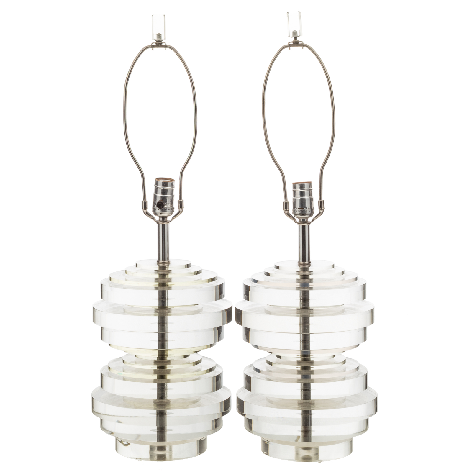 A PAIR OF LUCITE LAMPS IN THE