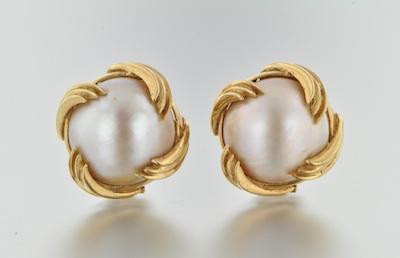A Pair of Mabe Pearl Earclips 14k