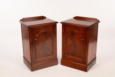 A pair of mahogany bedside