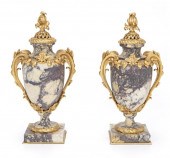 A PAIR OF MARBLE AND GILT BRON