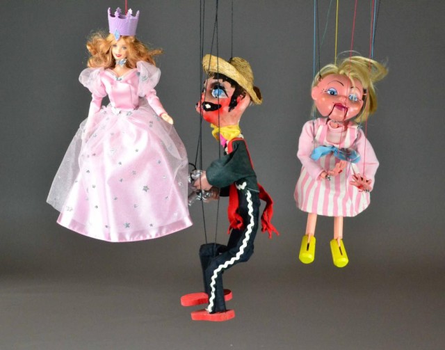 A PAIR OF MARIONETTE PUPPETTSA made