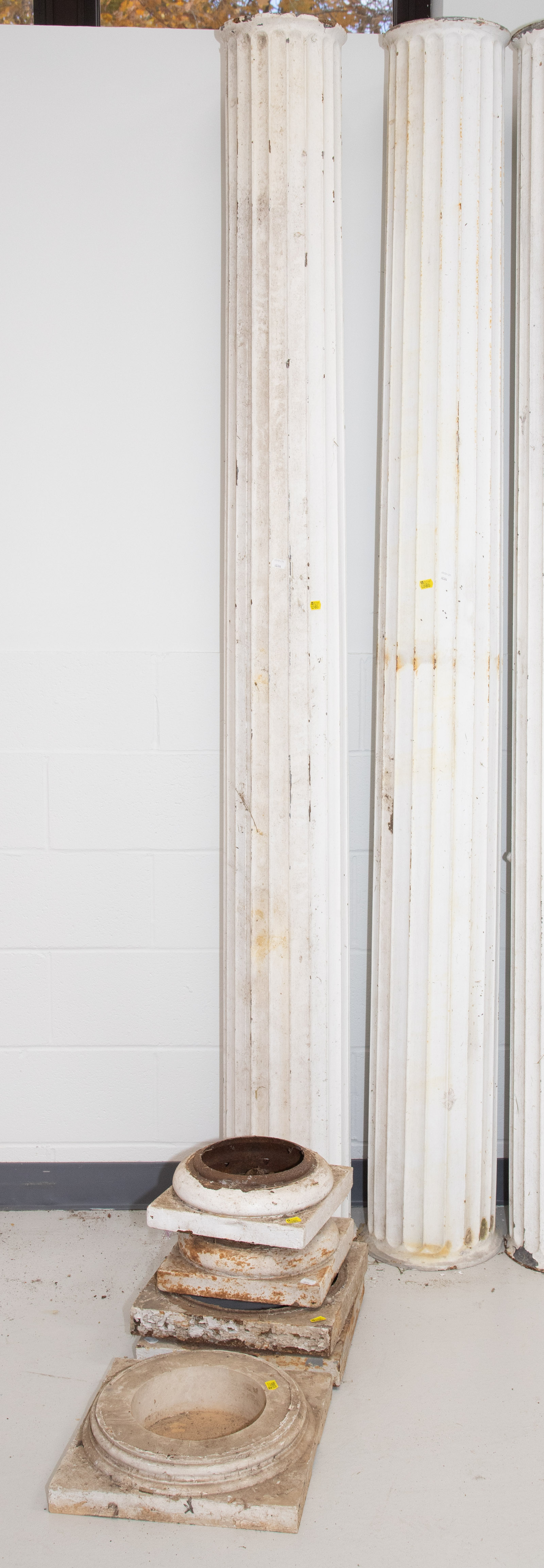 A PAIR OF METAL DORIC COLUMNS