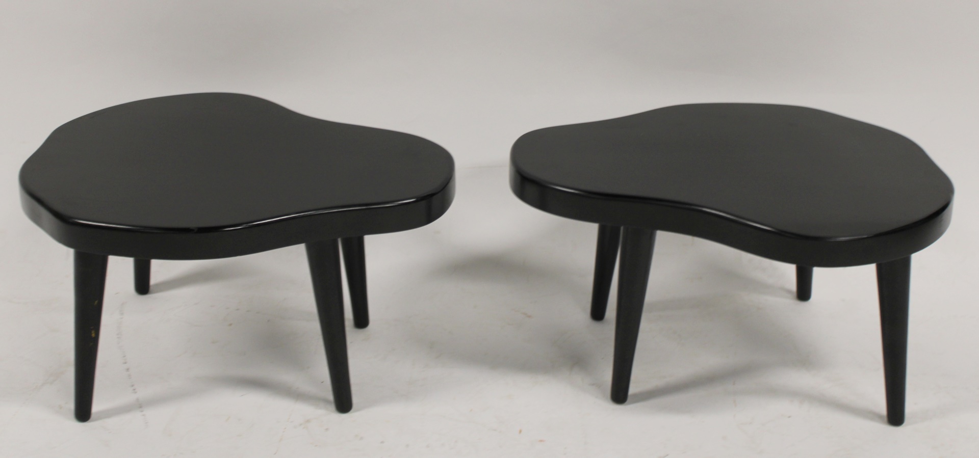 A PAIR OF MIDCENTURY STYLE EBONISED