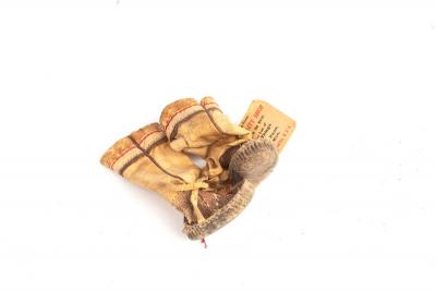 A pair of miniature walrus skin