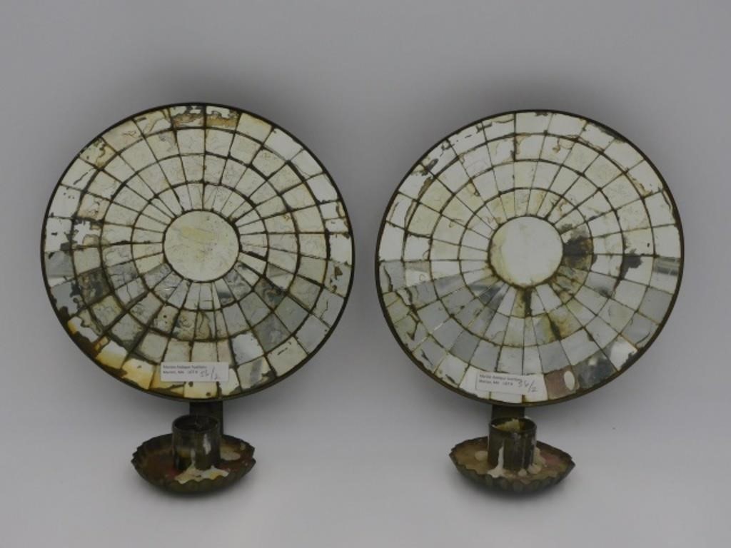 A PAIR OF MIRRORED TIN WALL