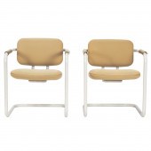 A PAIR OF MODERN ARMCHAIRS A p