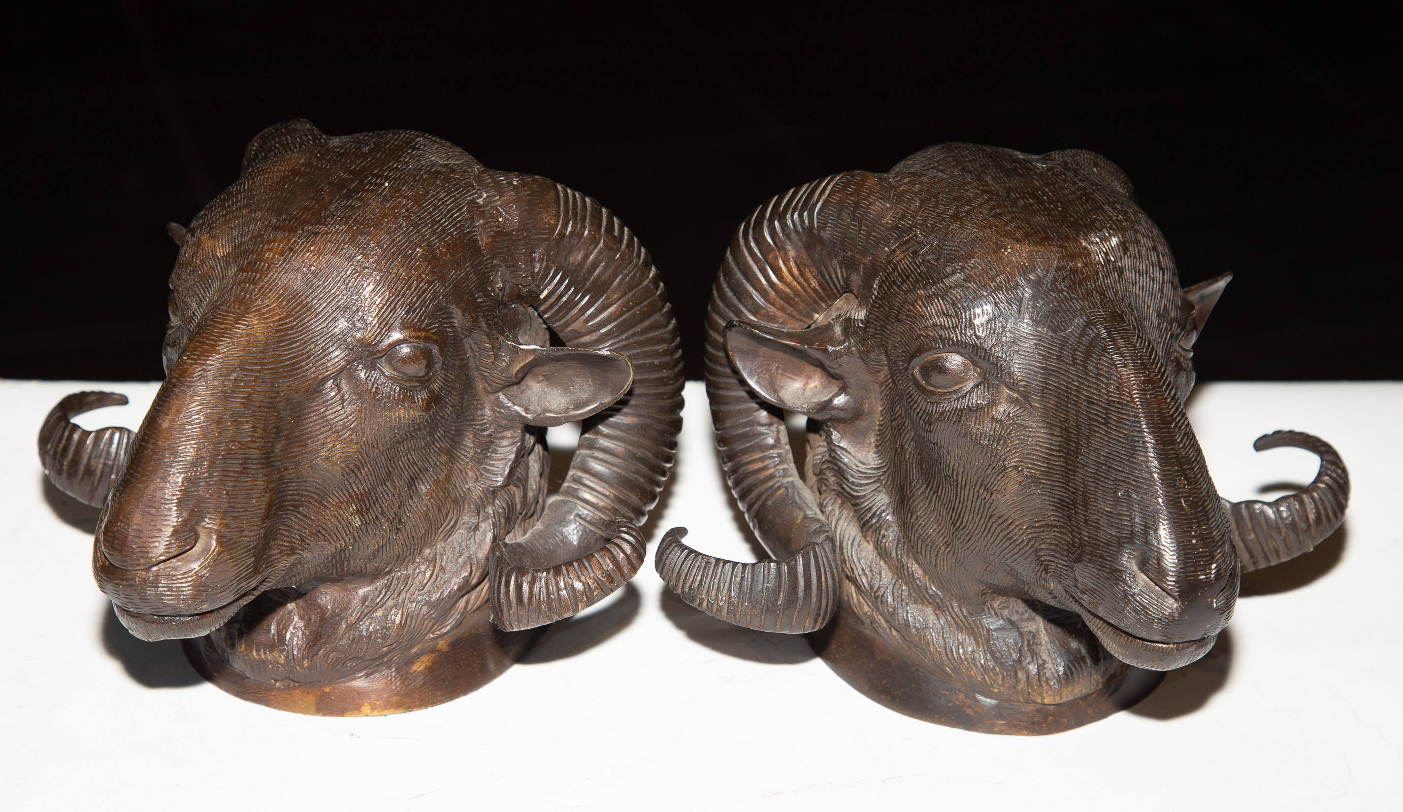 A PAIR OF MODERN BRONZE RAM
