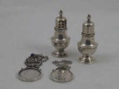 A pair of modern silver pepper