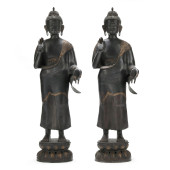 A PAIR OF NEPALESE PATINATED M