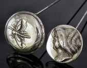 A pair of ''Norene'' silvery c