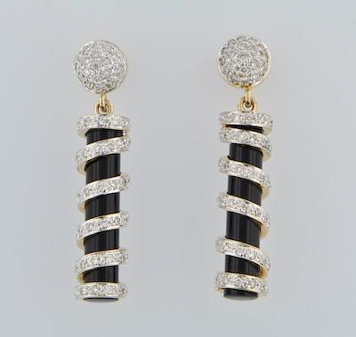 A Pair of Onyx and Diamond Earrings