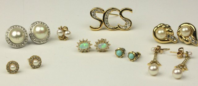 A pair of opal and diamond
