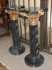 A PAIR OF ORMOLU AND BLACK POR