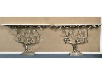 A pair of painted iron consoles,