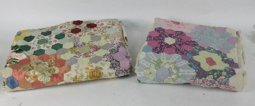 A pair of patchwork bed quilts