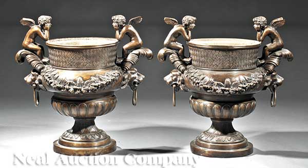 A Pair of Patinated Bronze Campagna