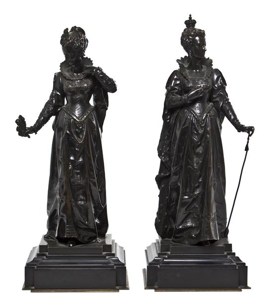 A Pair of Patinated Bronze