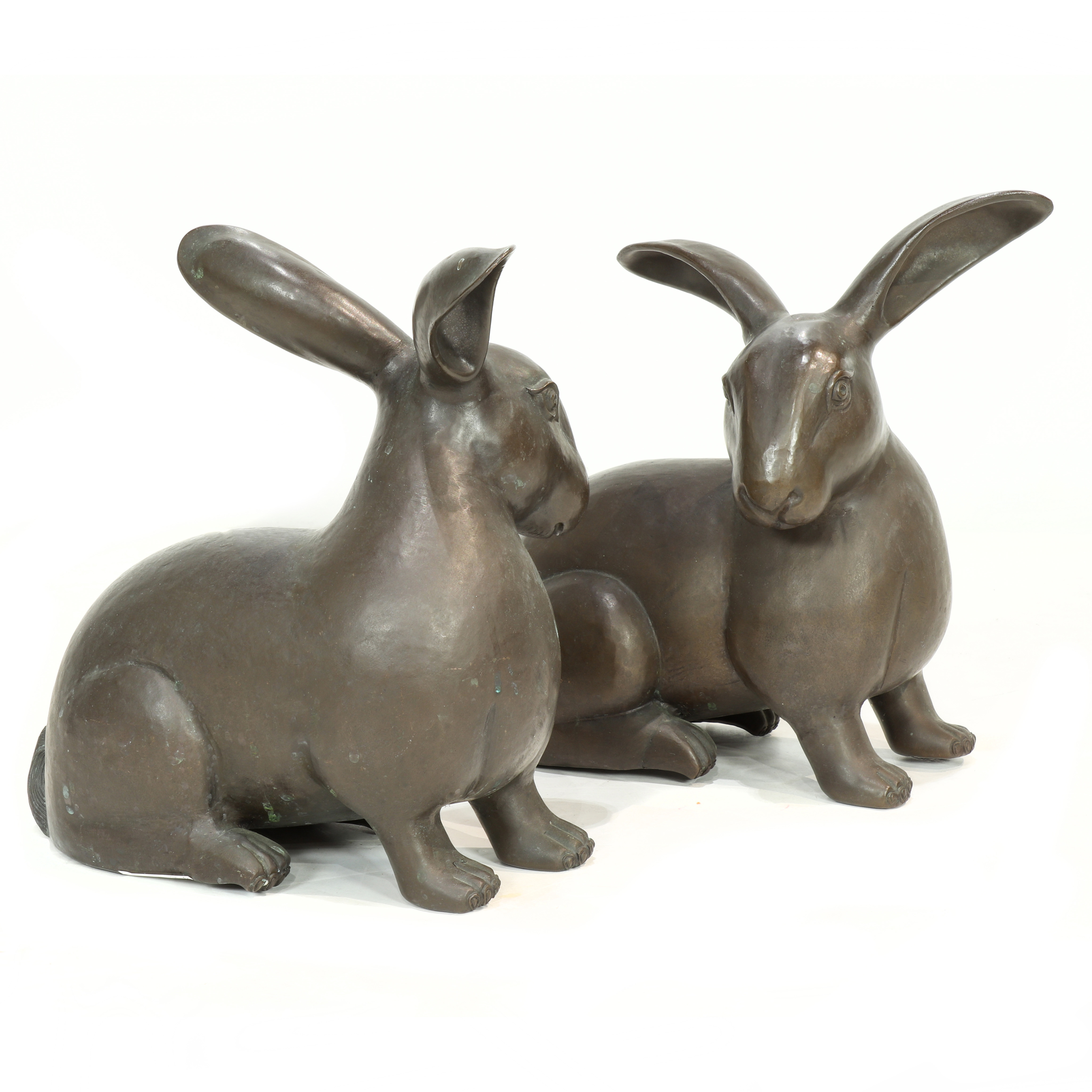 A PAIR OF PATINATED COPPER