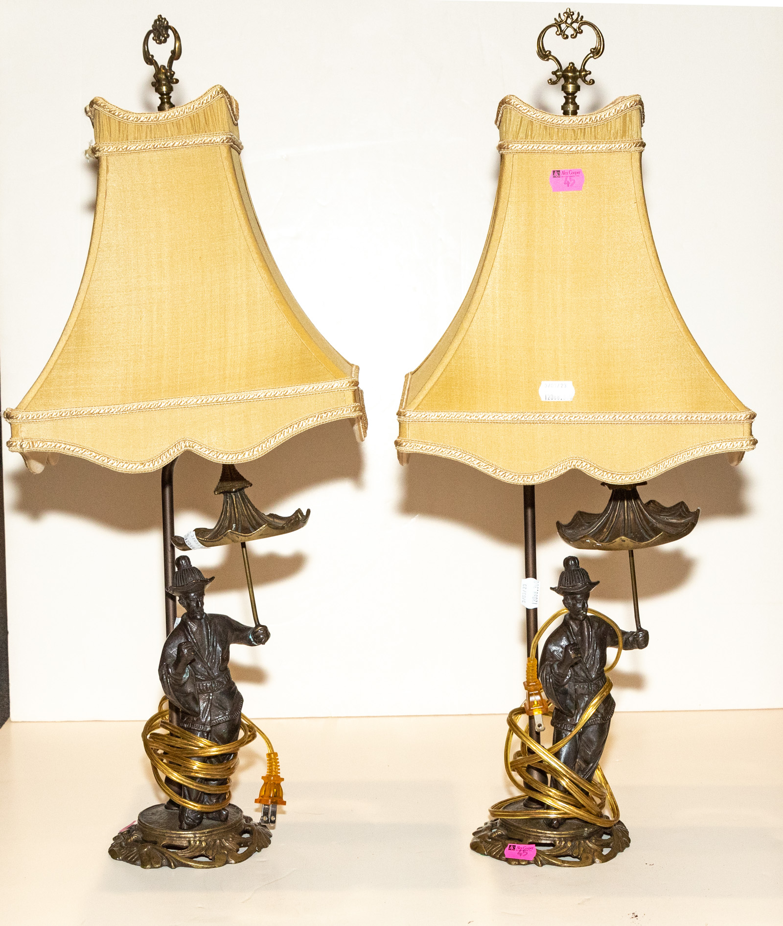 A PAIR OF PATINATED METAL MALABAR