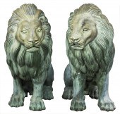 A PAIR OF PATINATED METAL OUTD