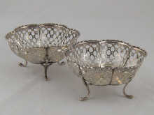 A pair of pierced bonbon dishes