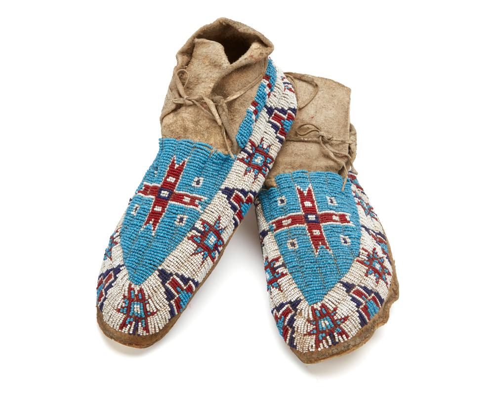 A PAIR OF PLAINS BEADED HIDE