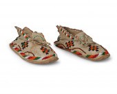 A PAIR OF PLAINS BEADED HIDE M