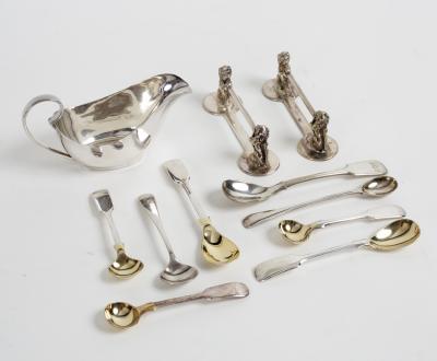 A pair of plated knife rests with