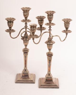 A pair of plated three-light