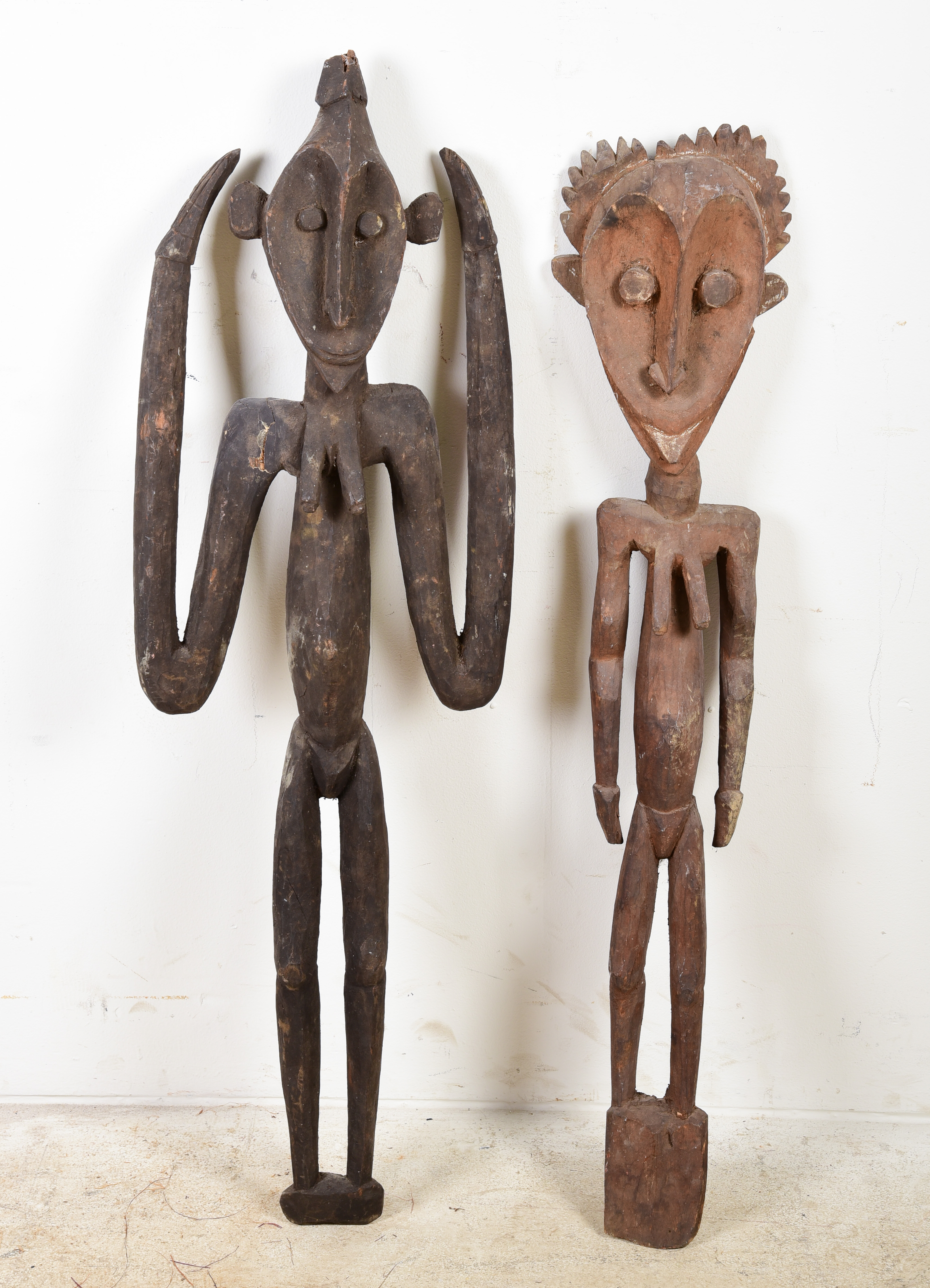A pair of PNG carved wood