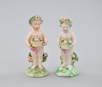 A Pair of Porcelain Figurines of