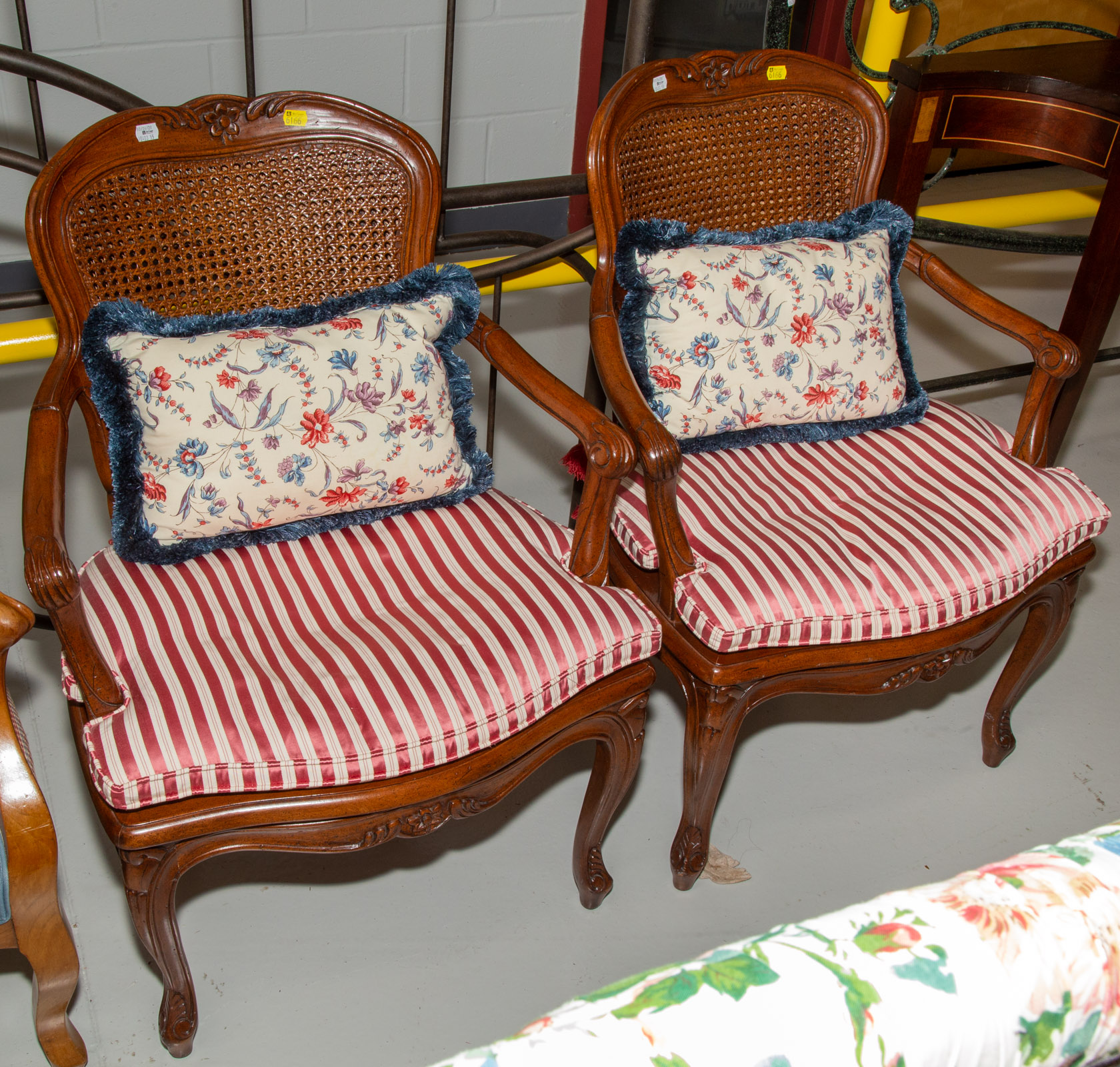 A PAIR OF RATTAN & CARVED WOOD
