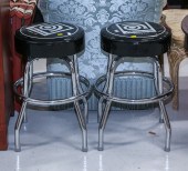 A PAIR OF REVOLVING STOOLS WIT