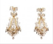 A PAIR OF ROCOCO STYLE GILT BR