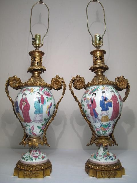 A pair of Rose Famille vases