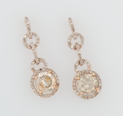 A Pair of Rose Gold and Diamond