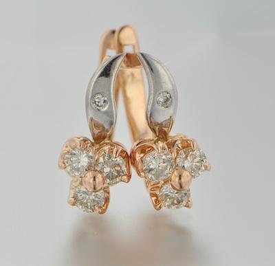 A Pair of Rose Gold and Diamond