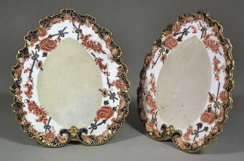 A pair of Royal Crown Derby bone