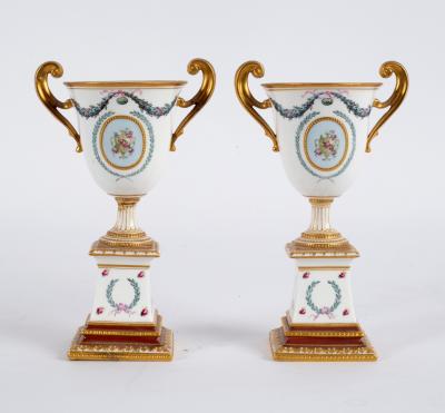 A pair of Royal Crown Derby urns on