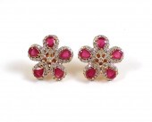 A PAIR OF RUBY, DIAMOND AND FO