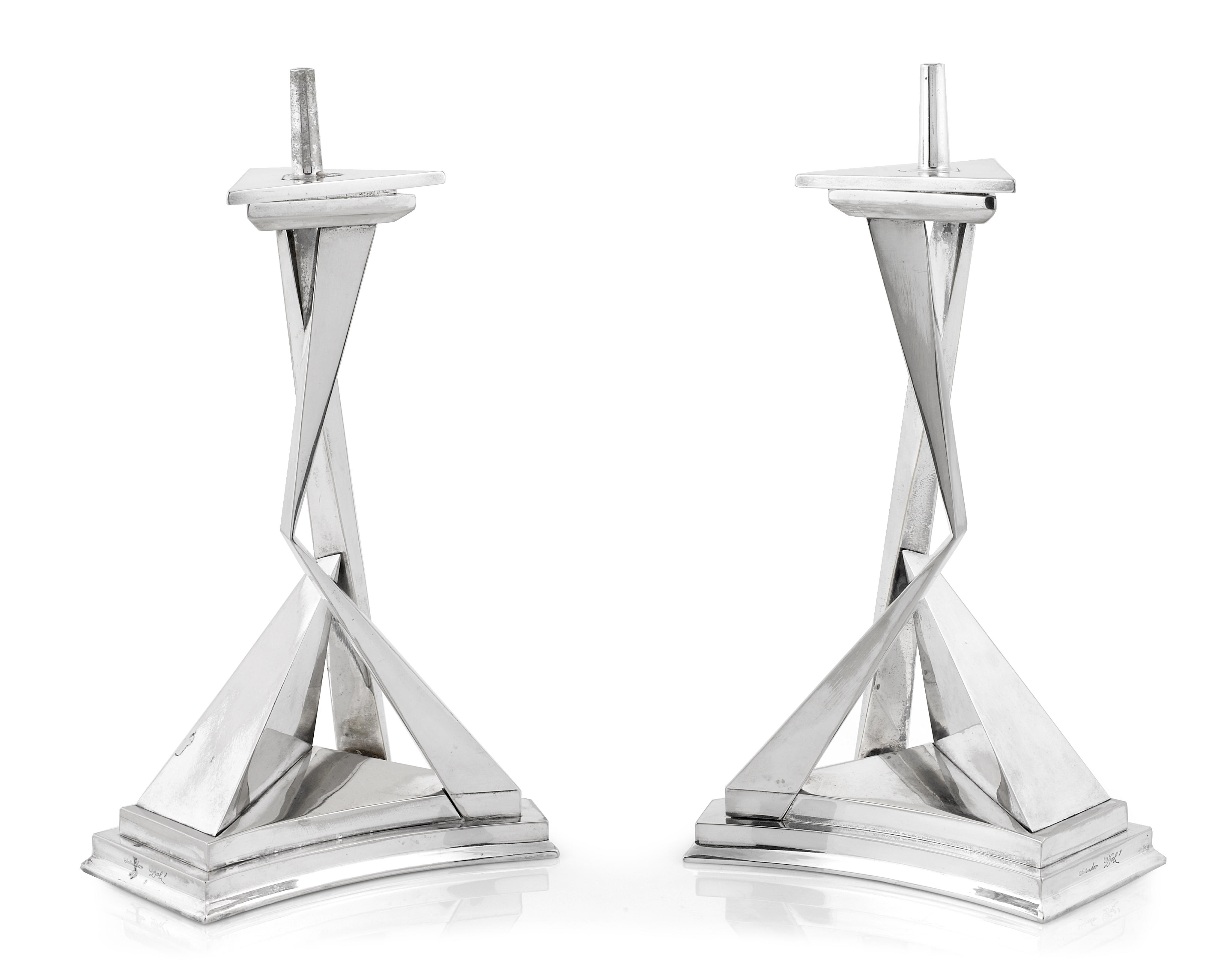 A pair of Salvador Dali chromium