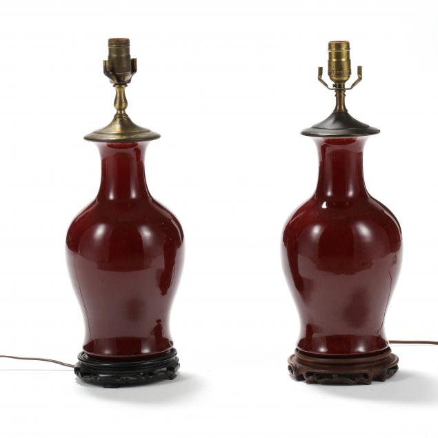 A PAIR OF SANG DE BOEUF VASE