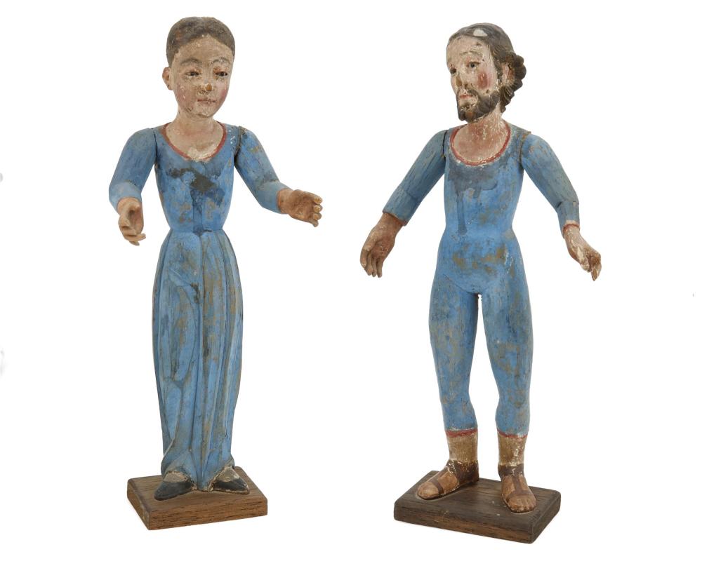 A PAIR OF SANTOS FIGURESA pair of