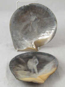 A pair of signed mother of pearl