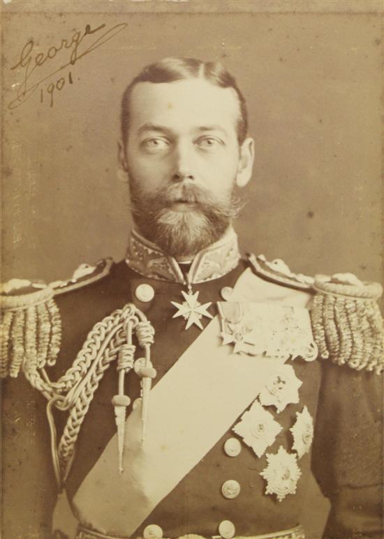 A pair of signed photographs of