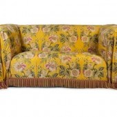 A Pair of Silk Upholstered Cou