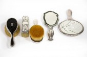 A pair of silver and tortoises