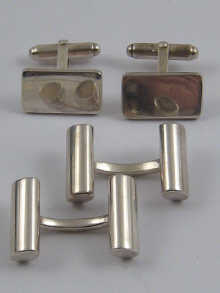 a pair of silver bar cufflinks by